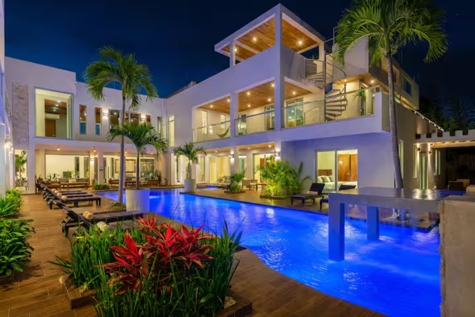Private villa pool at night, selected by Travel GHR for a travel advisor event.